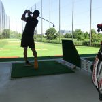 Golfer Practicing at 21Golf Netted Driving Range