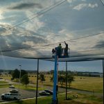 Installing Overhead Netting on Enclosure