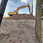 Setting Net Support Poles