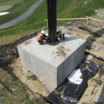 Steel Pole Installation onto concrete footer slab