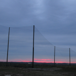 Sunset view of the completed Golf Barrier Netting Install
