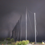 Fog rolling in at the end of the day installing Golf Netting Panels