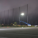 Fog rolled in at the end of the day installing golf netting panels