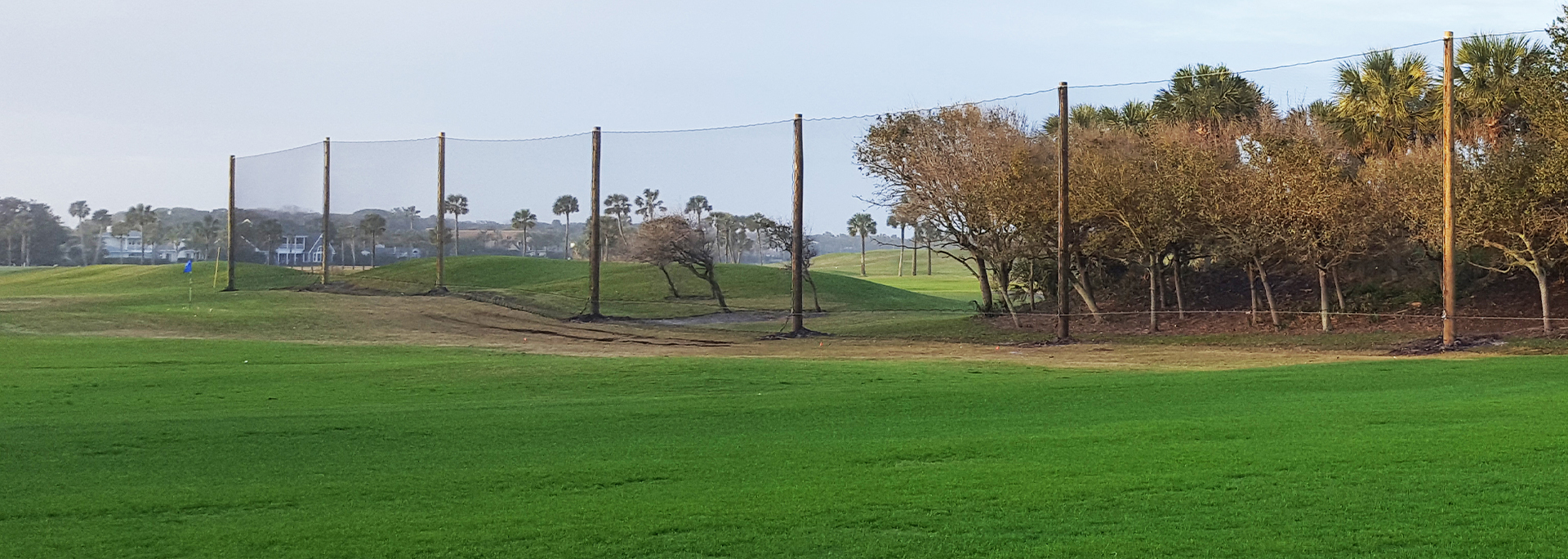 Driving range barrier netting