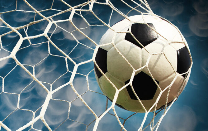 Soccer ball in soccer netting