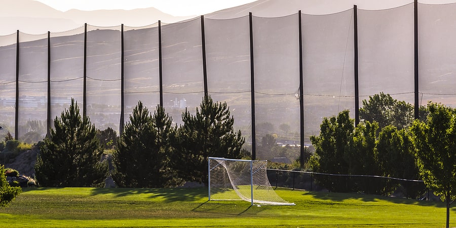 Soccer net on green field