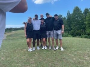 Golf Range Netting President Karianne Ramsay, VJ Singh